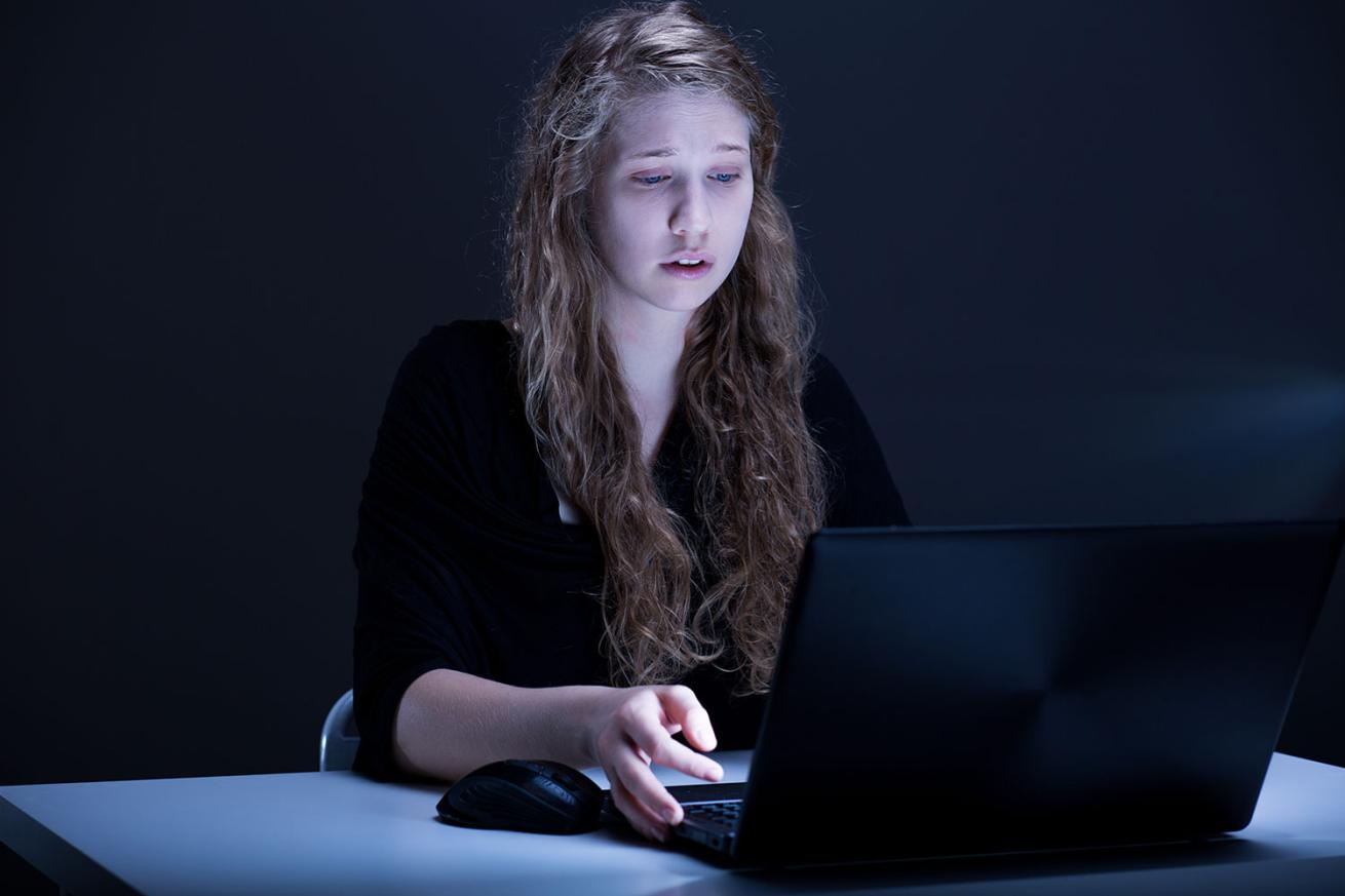 Woman sitting at computer