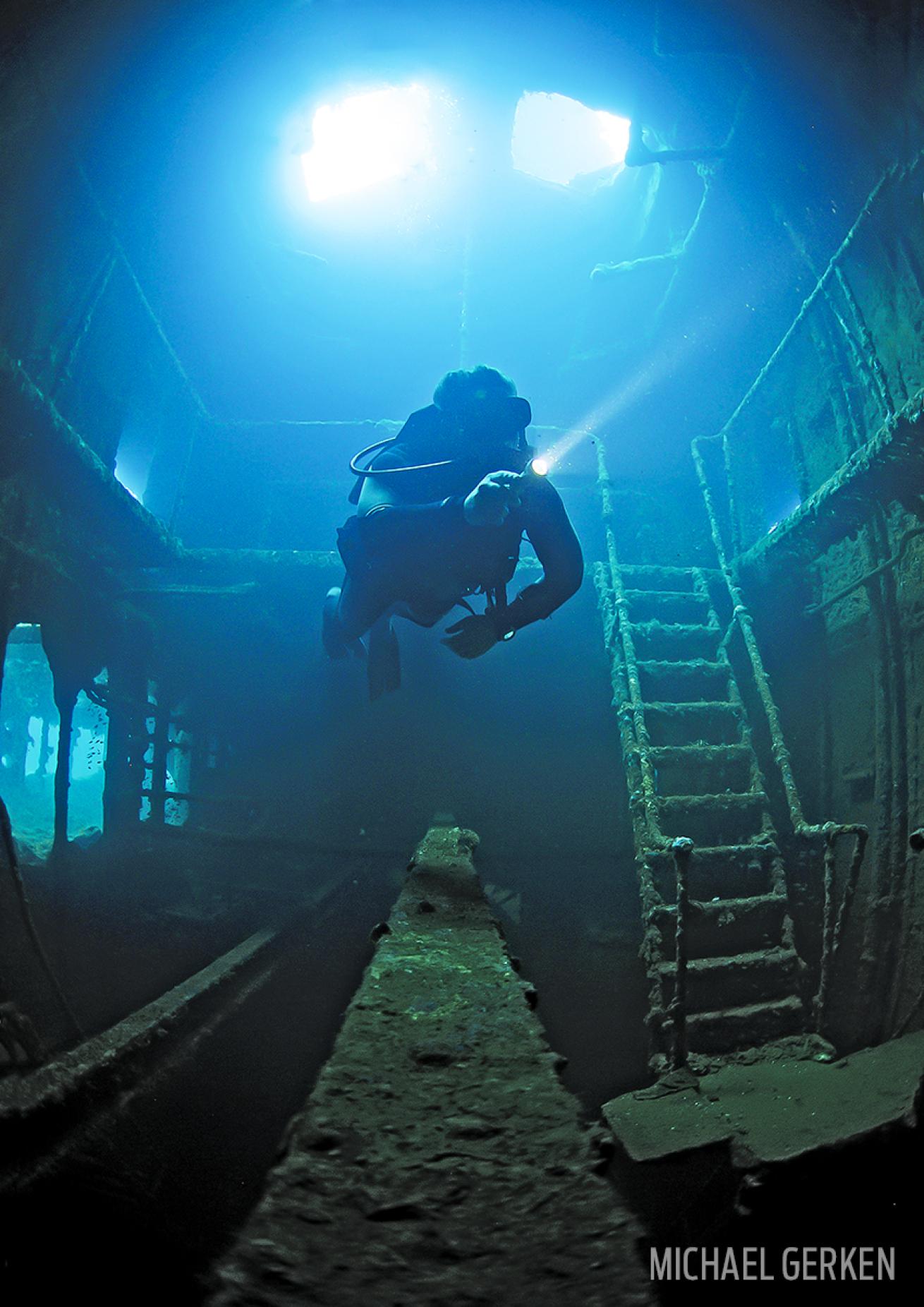 Underwater Scuba Diver in Truk Chuuk Lagoon Shipwreck