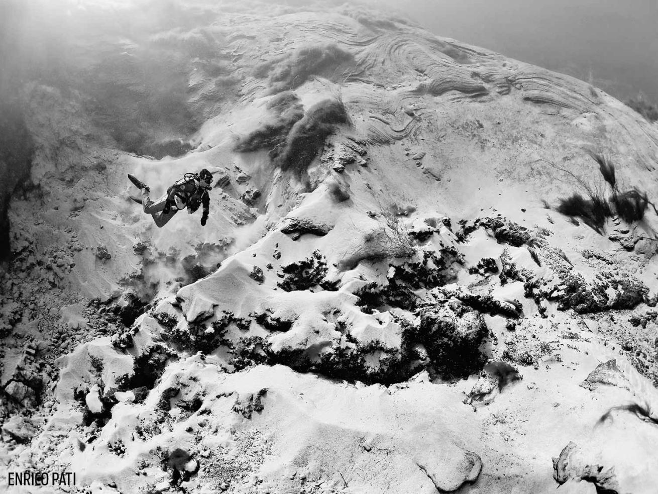 black white photo underwater desert italy scuba diver