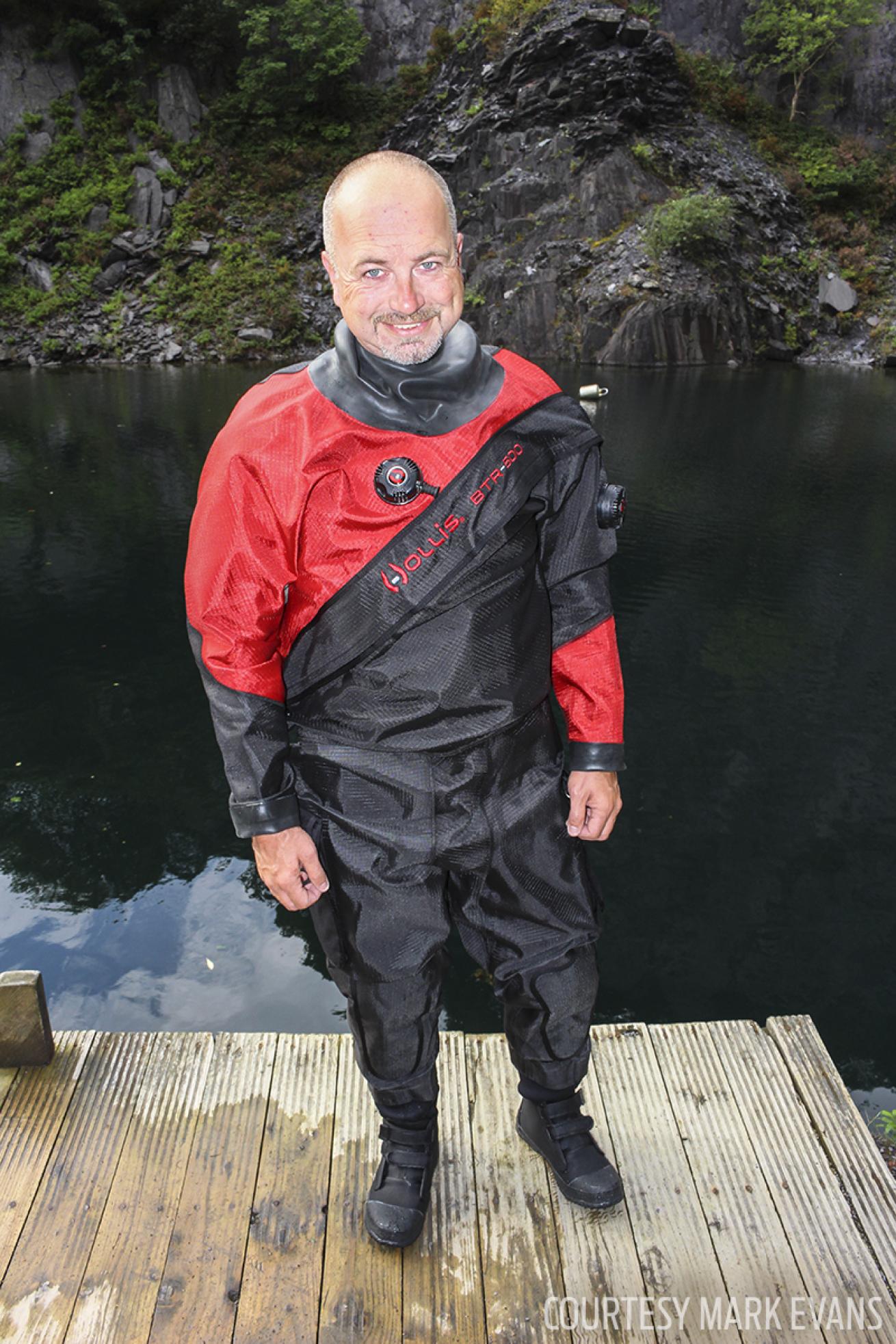 ScubaLab test diver Mark Evans posing in a Hollis drysuit