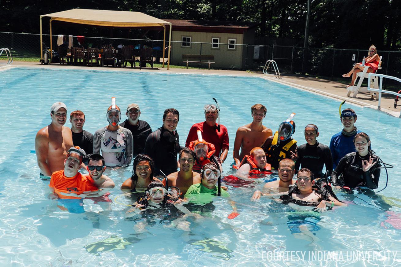 Campers and instructors at Camp Riley's adaptive scuba program