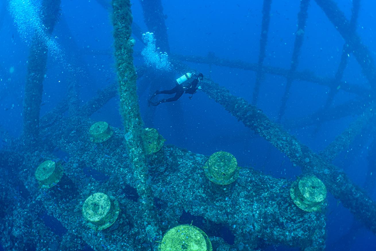 Diver exploring High Island 389A