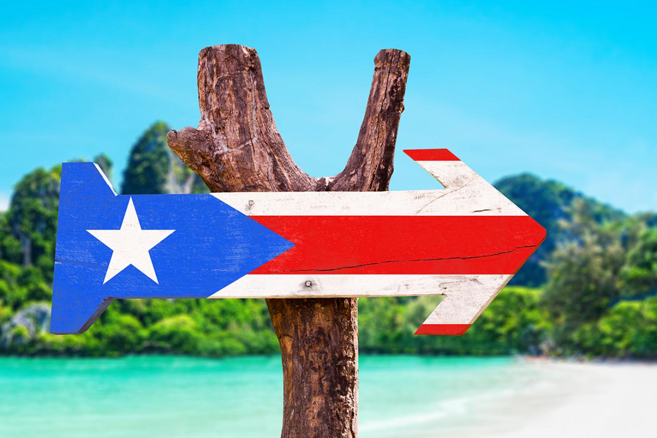 Puerto Rico Flag painted on a wooden sign