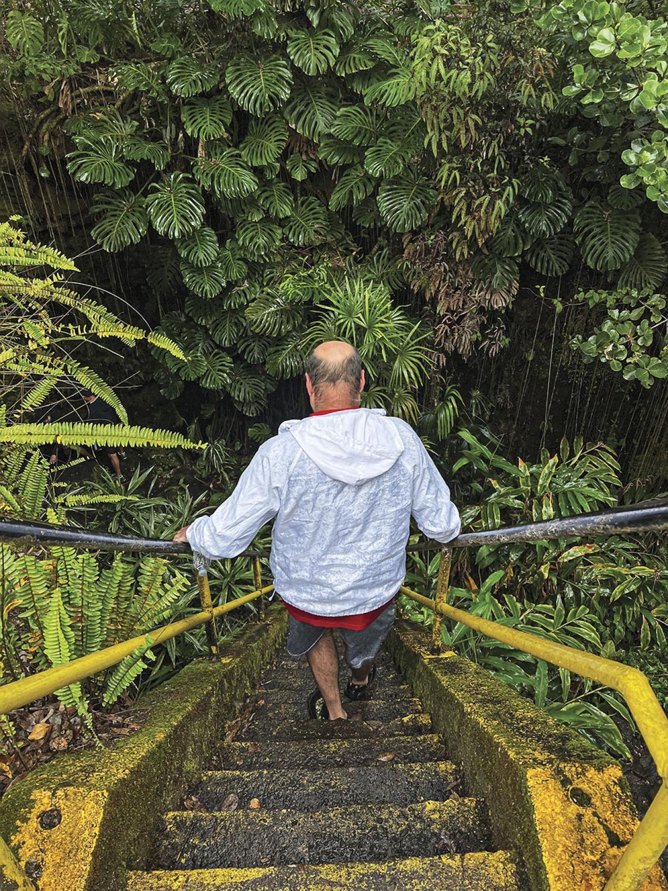 Candice’s dad descends into one of Hawaii’s many lava tubes.
