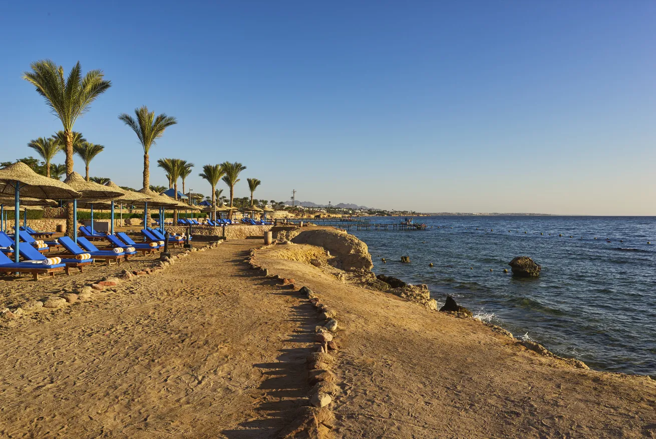 A jetty extending from the resort’s private beach escorts guests directly to the reef.