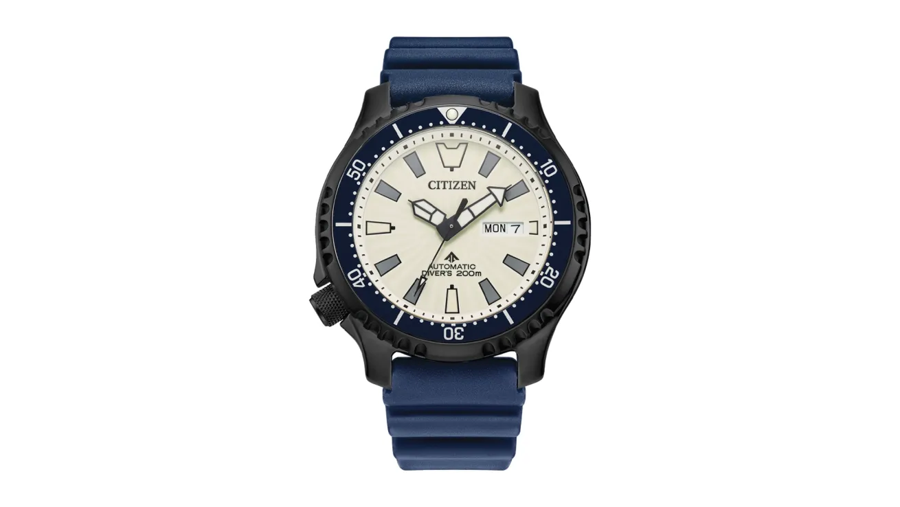 Citizen Promaster Dive Automatic “Fugu” watch with a black stainless steel case, white luminous dial, blue rotating bezel, and blue polyurethane strap.