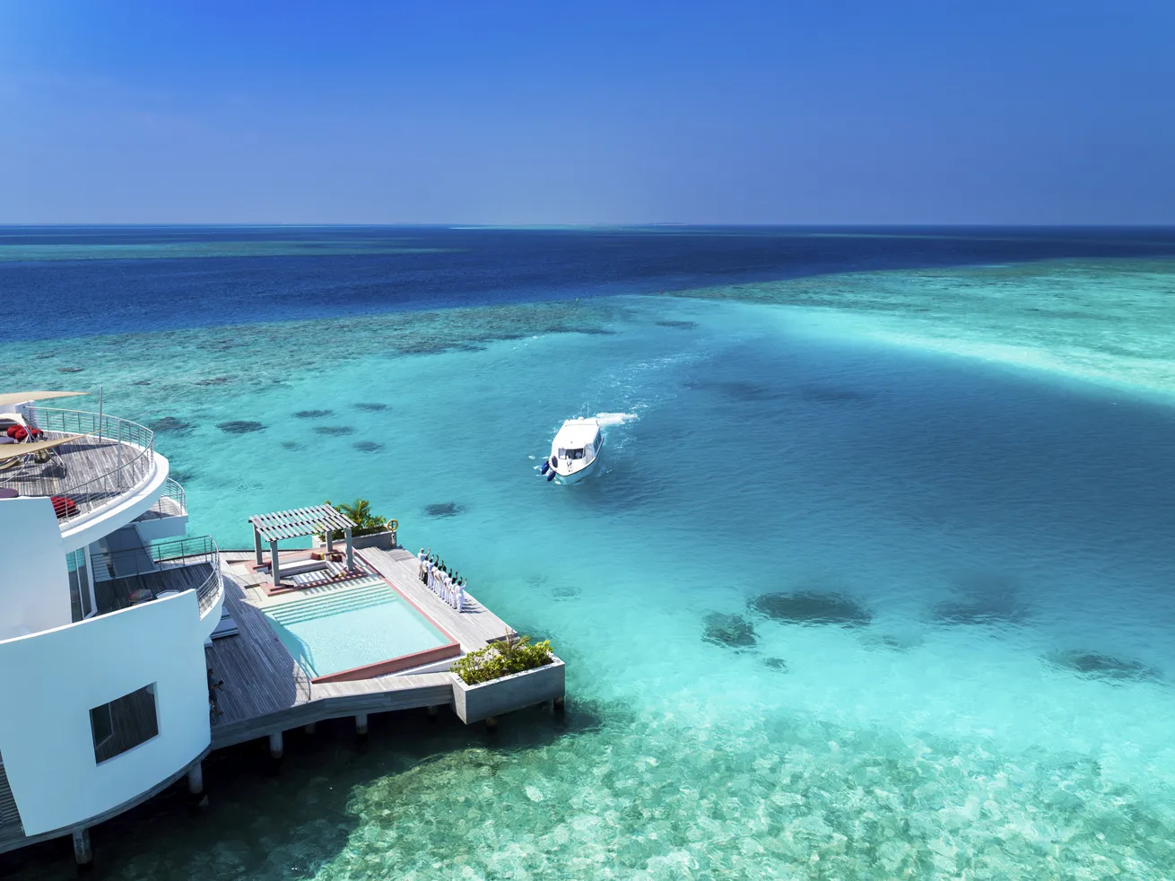 Guests staying in the three-bedroom overwater villa enjoy unobstructed views of the sea