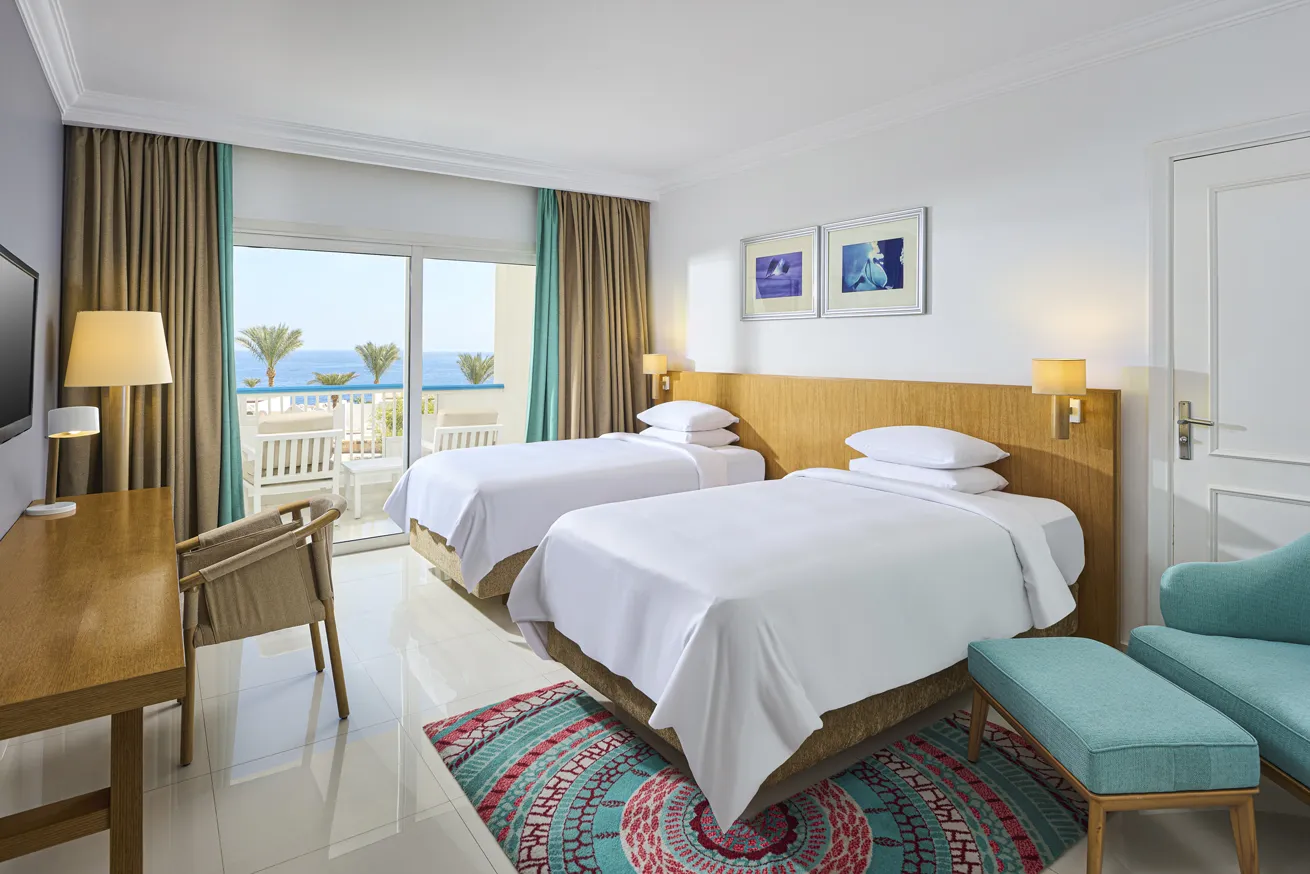 Guestrooms offer a simple, modern style and easy access to the beach, just steps away