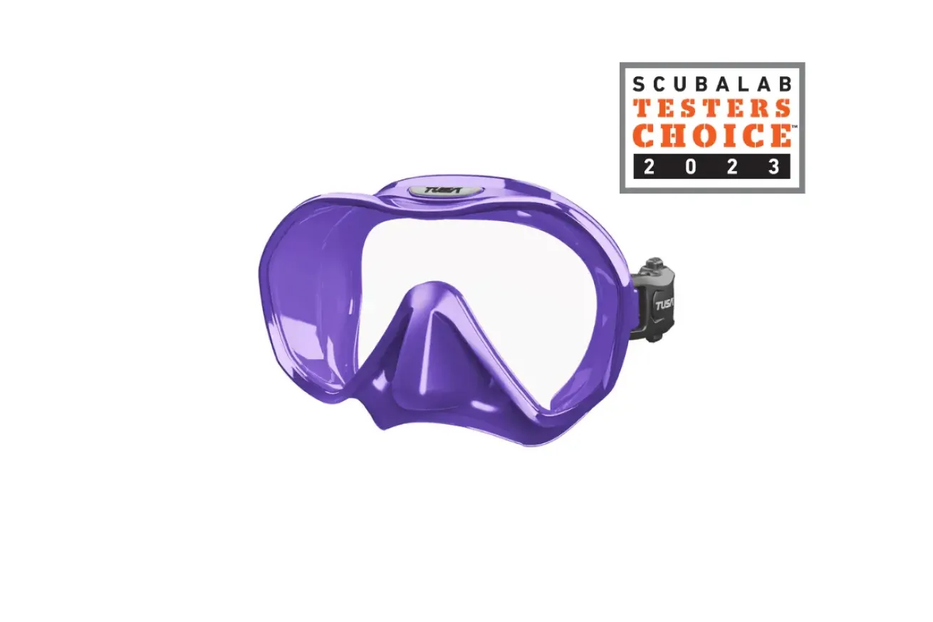 Purple frameless scuba diving mask with a wide single lens, ergonomic skirt, and adjustable strap for a comfortable, secure fit.