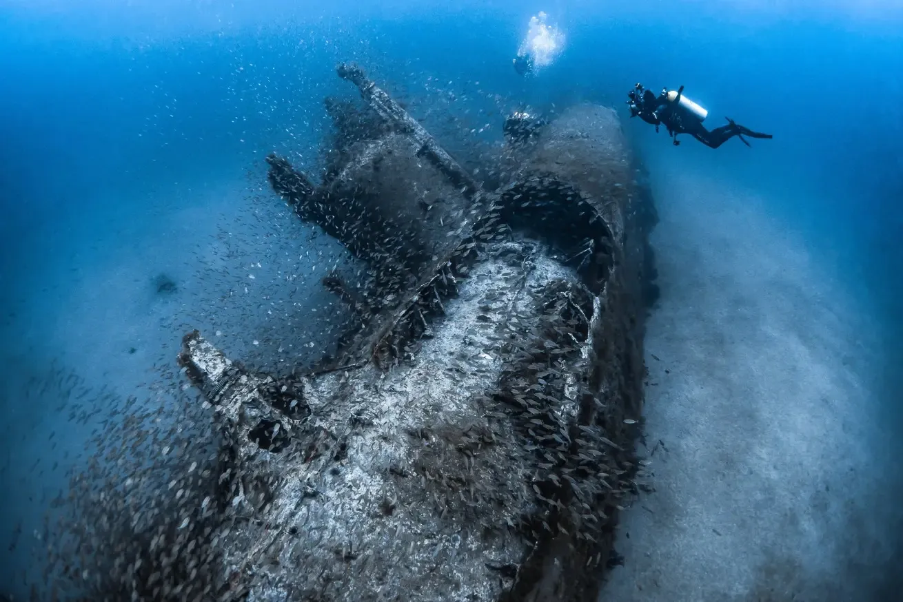Scuba diver exploring the U-352 German submarine wreck off the coast of North Carolina