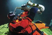Plura-Cave-concert C-Ha CC Akon-Skog-Erlandsen-aka-Jazzathelete-showing-off-his-saxophone-under-water-Photo-Pekka-Tuuri_edit.jpg.webp