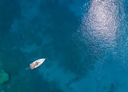 boat-on-ocean-aerial-shutterstock-vladimir-hodac.jpg.webp