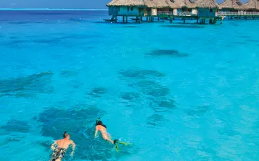 people-snorkeling-french-polynesia-shutterstock-juancat.jpg.webp
