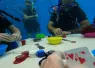 what_its_like_to_play_scuba_poker_underwater-_.png.webp