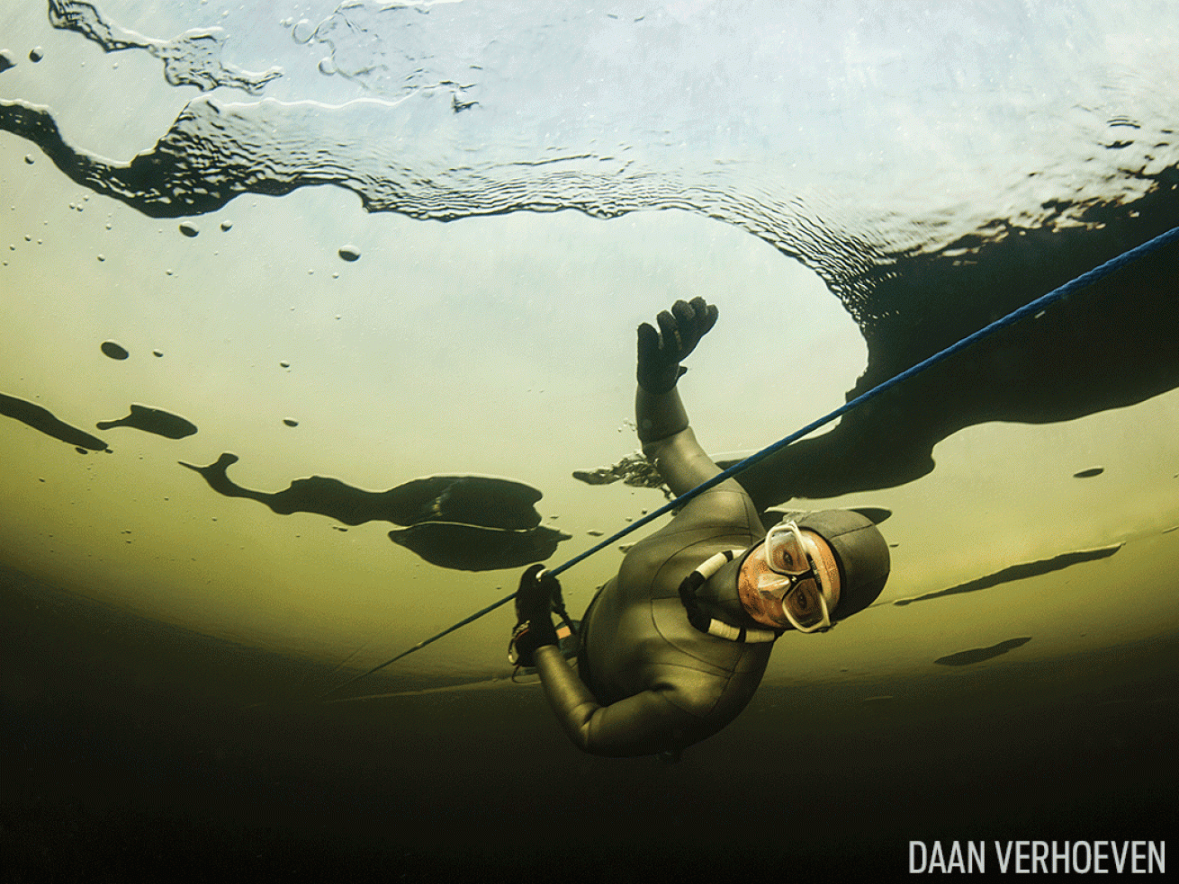 freediver ice diving underwater photo Lake Paijanne Finland