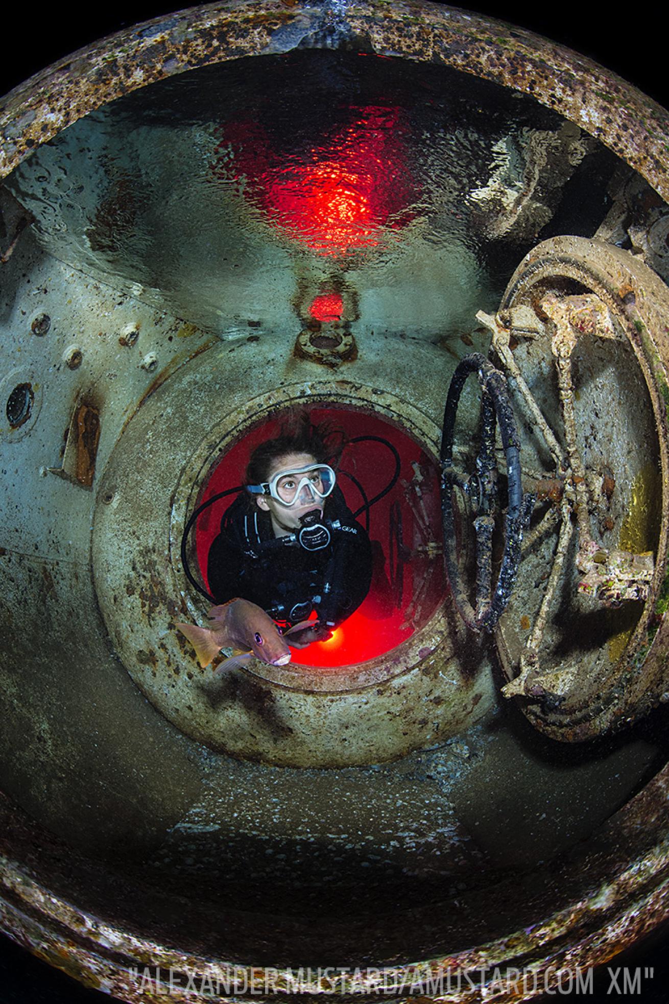 Scuba diver in Kittiwake Wreck Grand Cayman, Cayman Islands