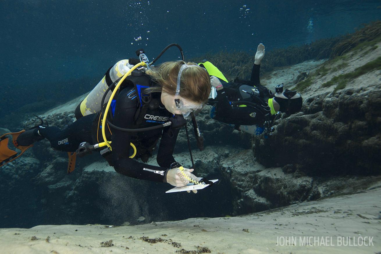 ScubaLab test divers underwater with scuba regulators