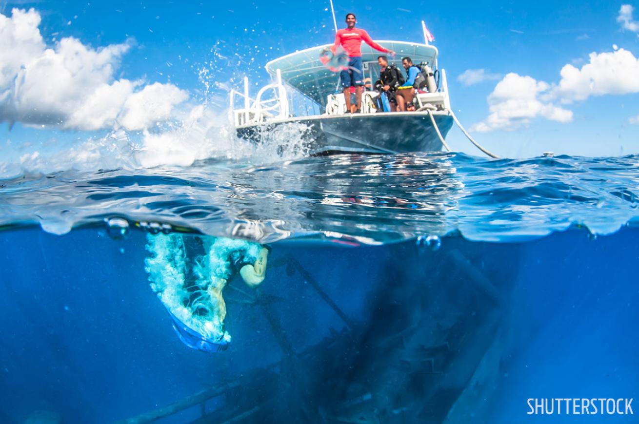 Scuba diving Grand Cayman shipwreck Kittiwake split image