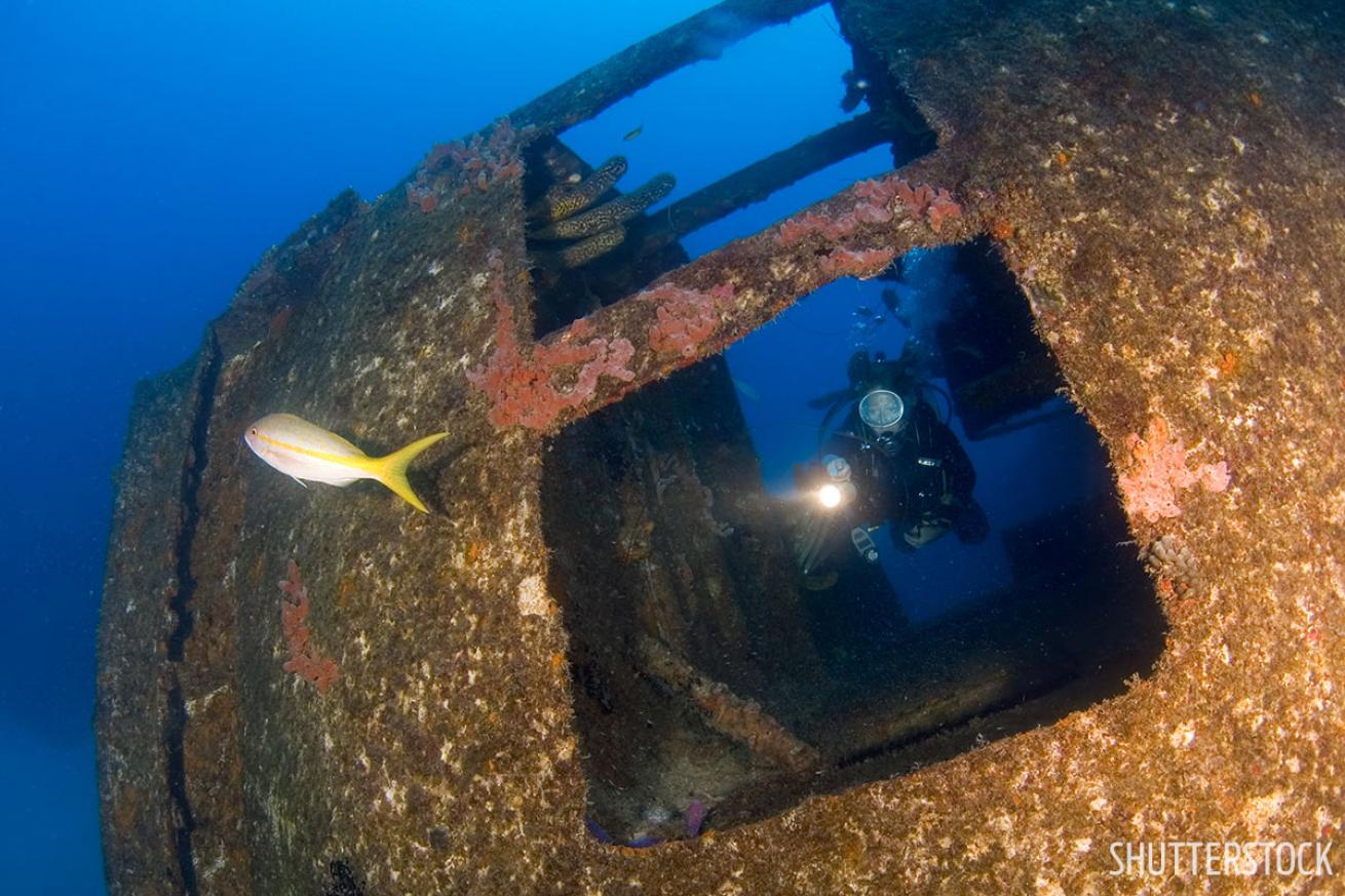 Scuba diver on the Hilma Hooker wreck in Bonaire