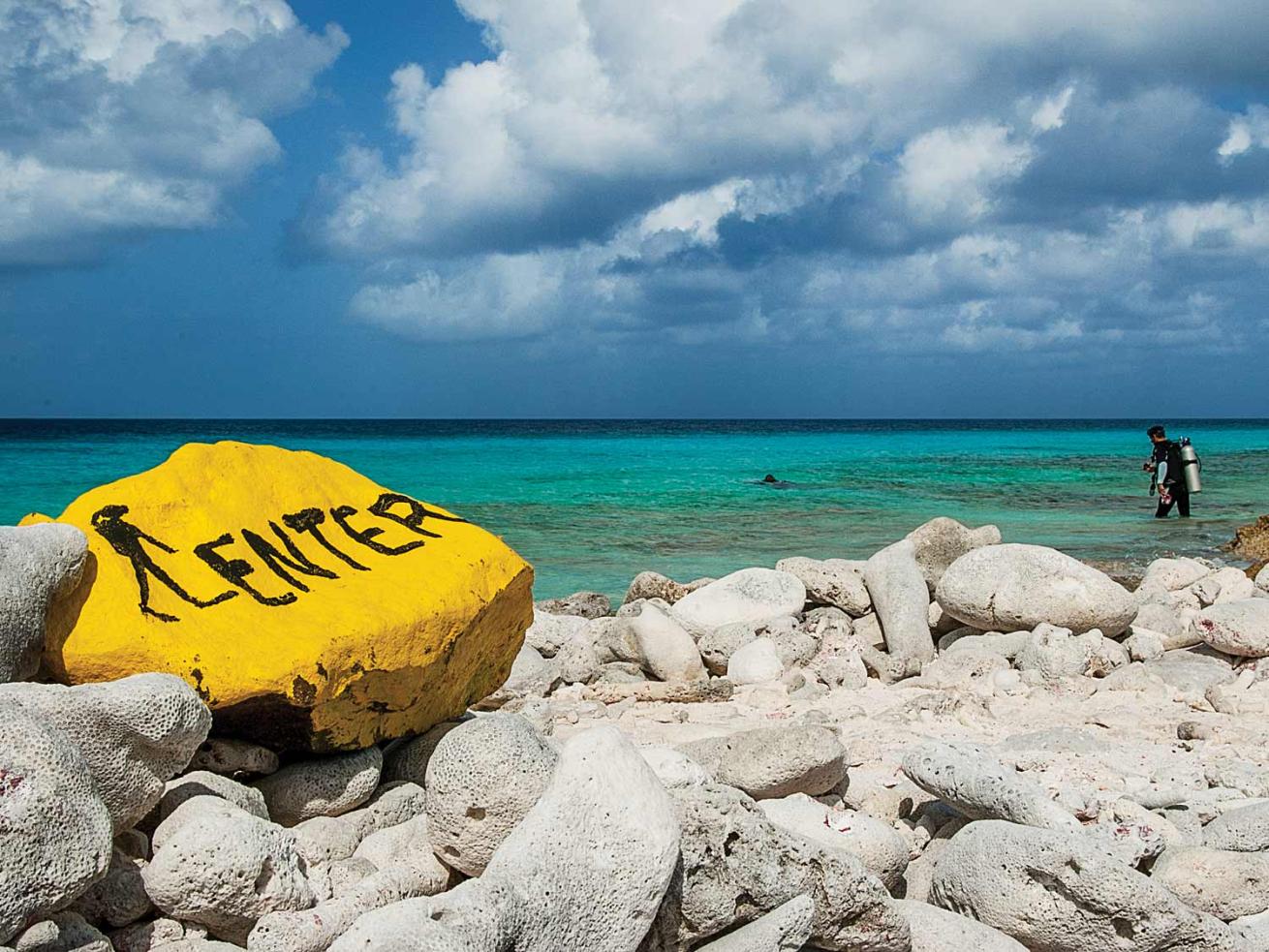 Painted stones mark Bonaire shore-diving sites