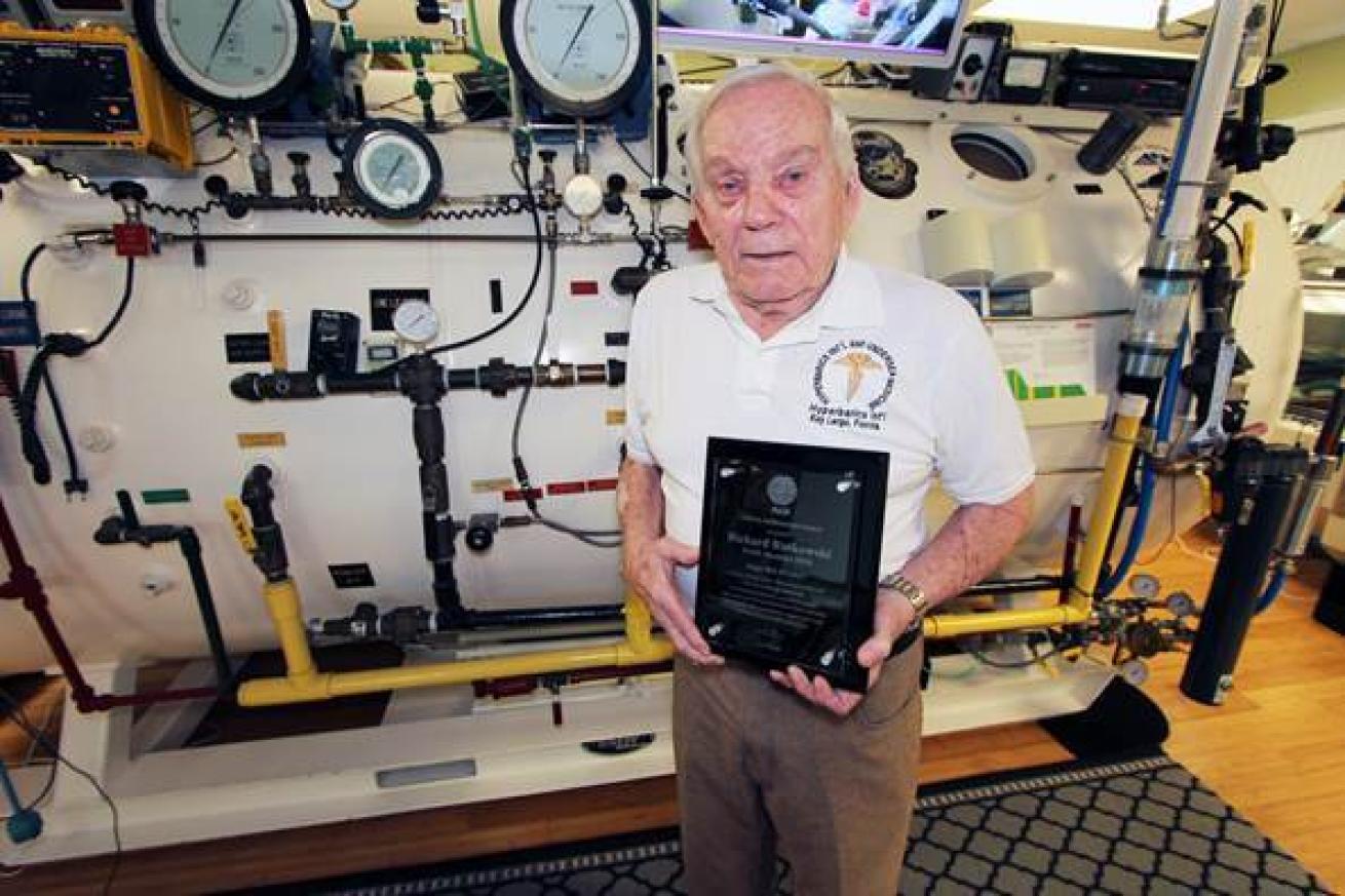 Dick Rutkowski holds a PADI Lifetime Achievement Award in Hyperbarics International
