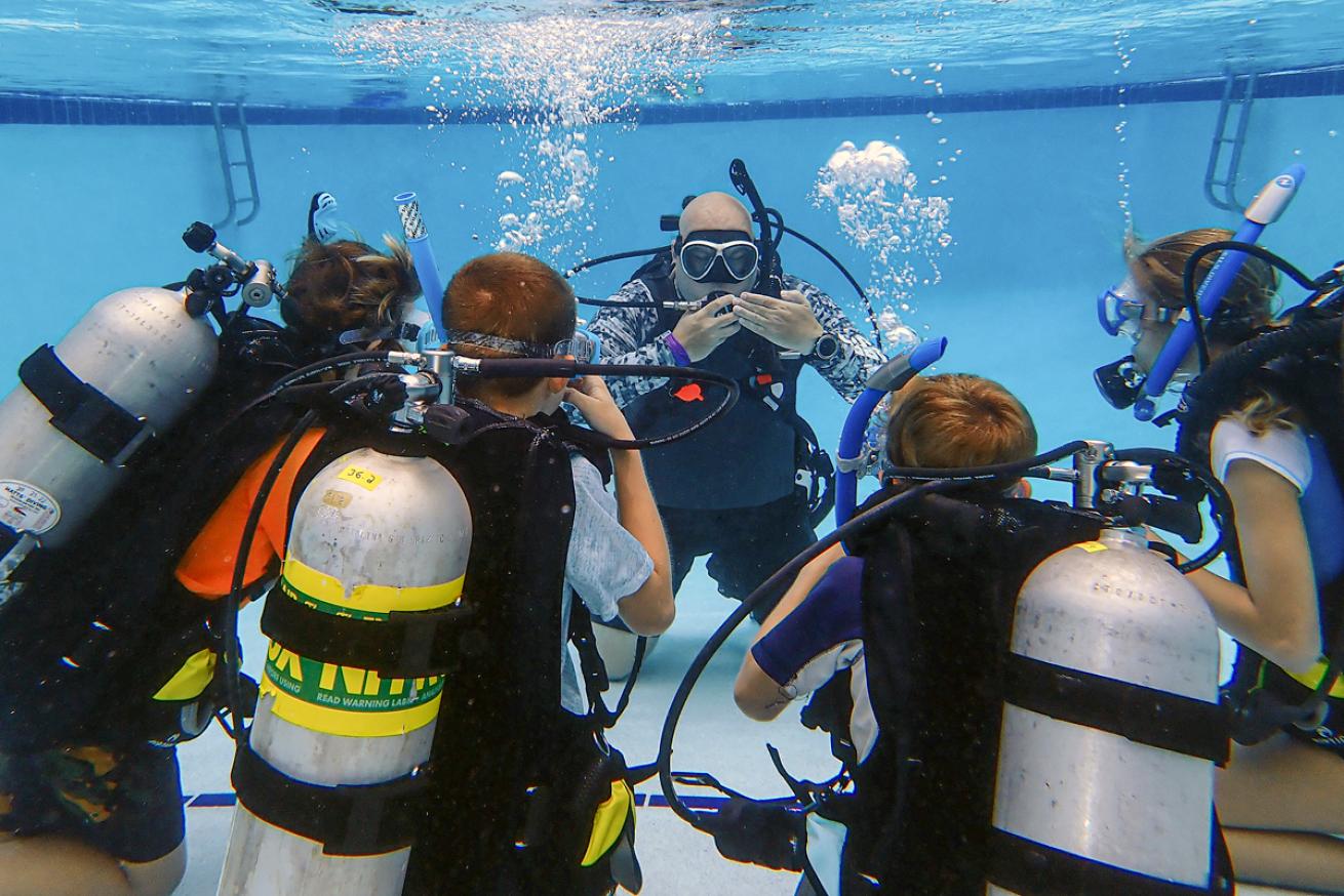 Anesti Vega Teaches Students in Pool