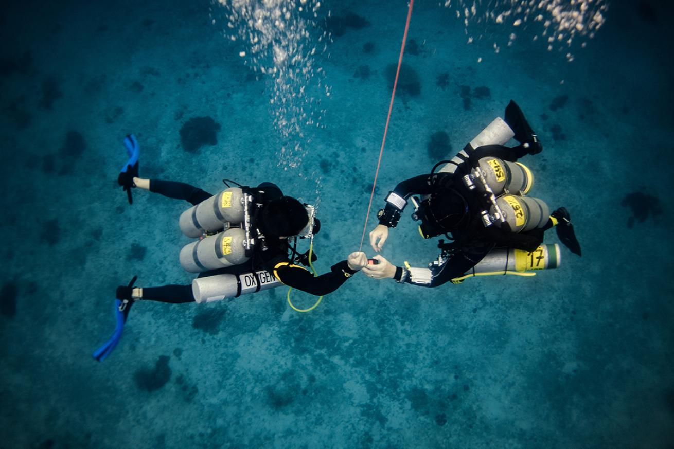 Tech divers during a decompression stop 
