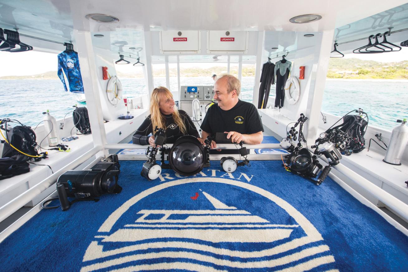 Underwater photographers on liveaboard deck