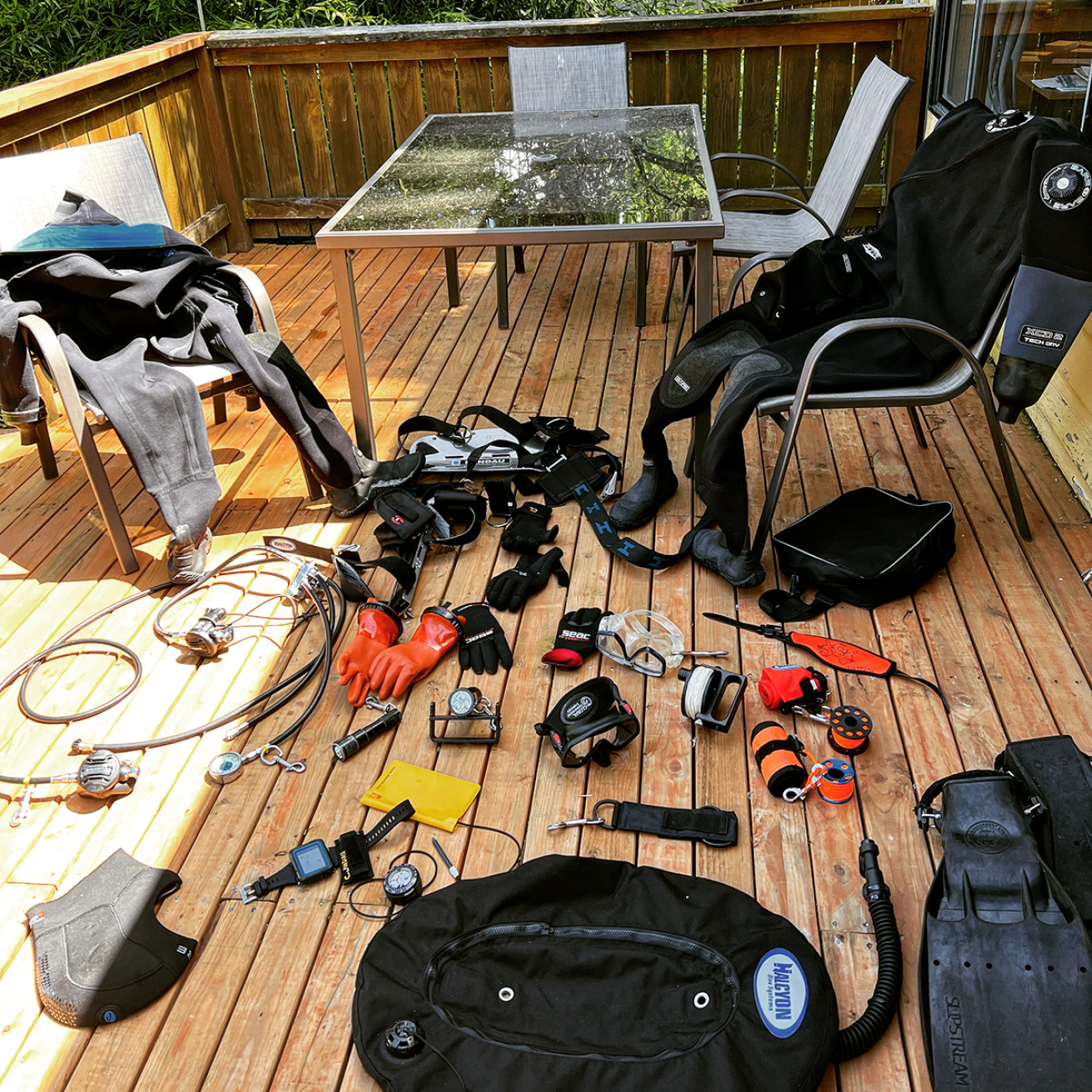 Scuba diving gear on a deck