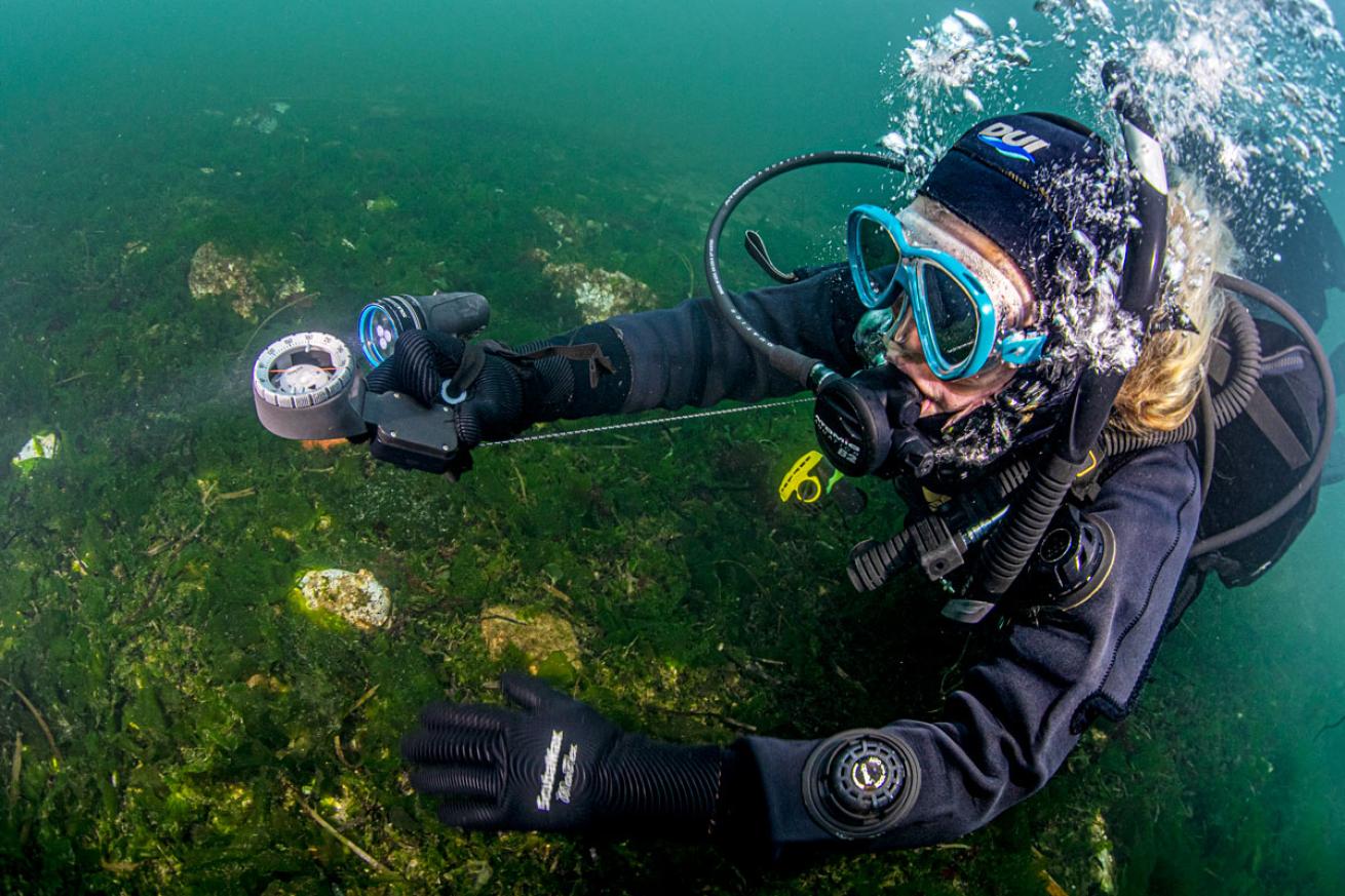 Annie Crawley navigating underwater