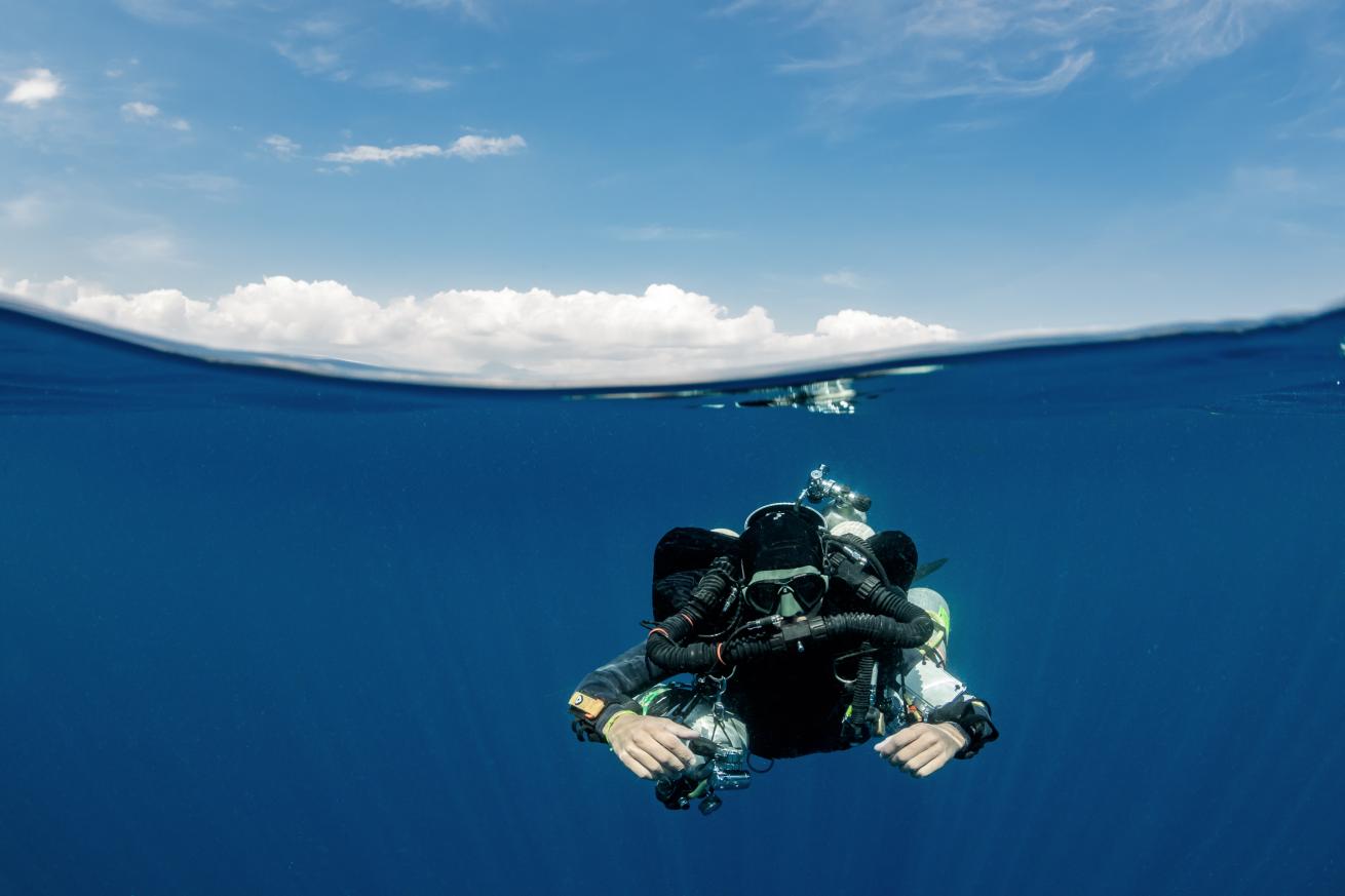A tech diver in the water.