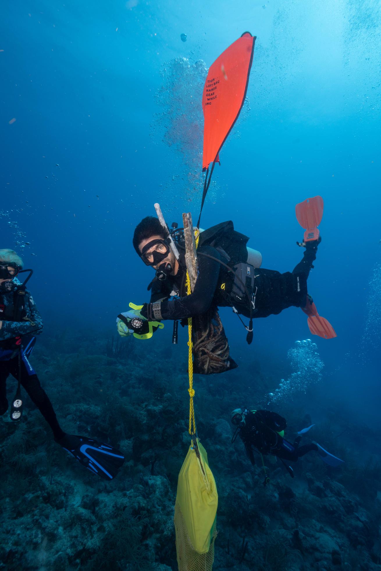 Key Dives Instructor Mike Ryan consolidates old line and broken pieces of lobster traps picked up during the I.CARE Trash Derby. 