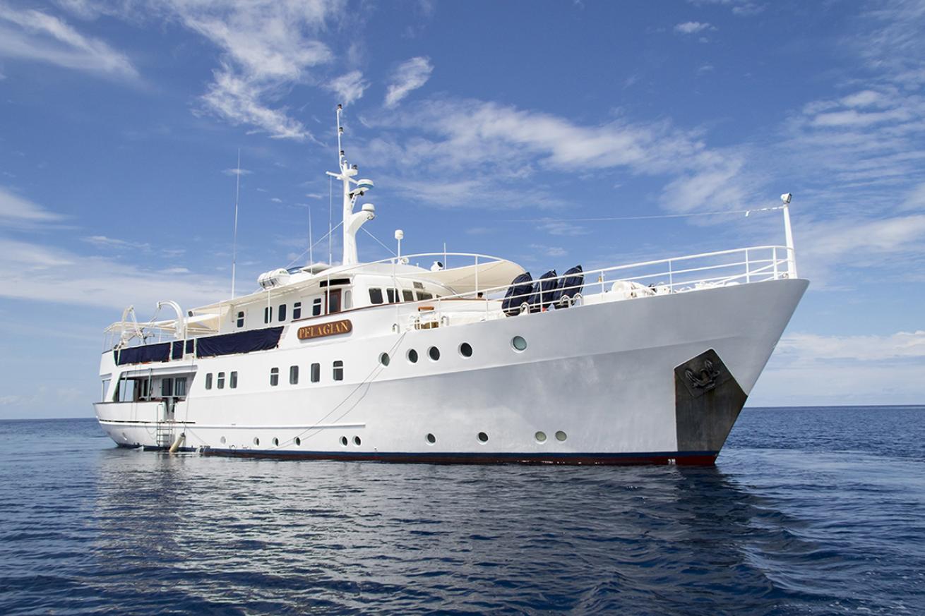 Large white yacht in ocean