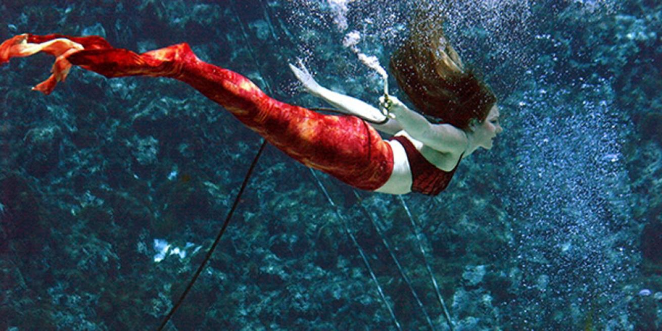 Scuba diving become a mermaid
