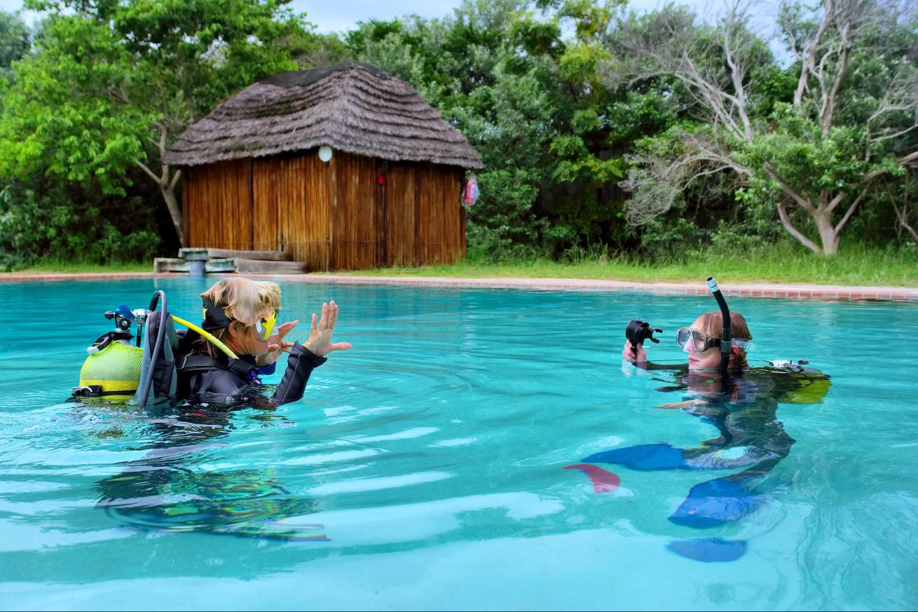 Scuba Divers in Water Training