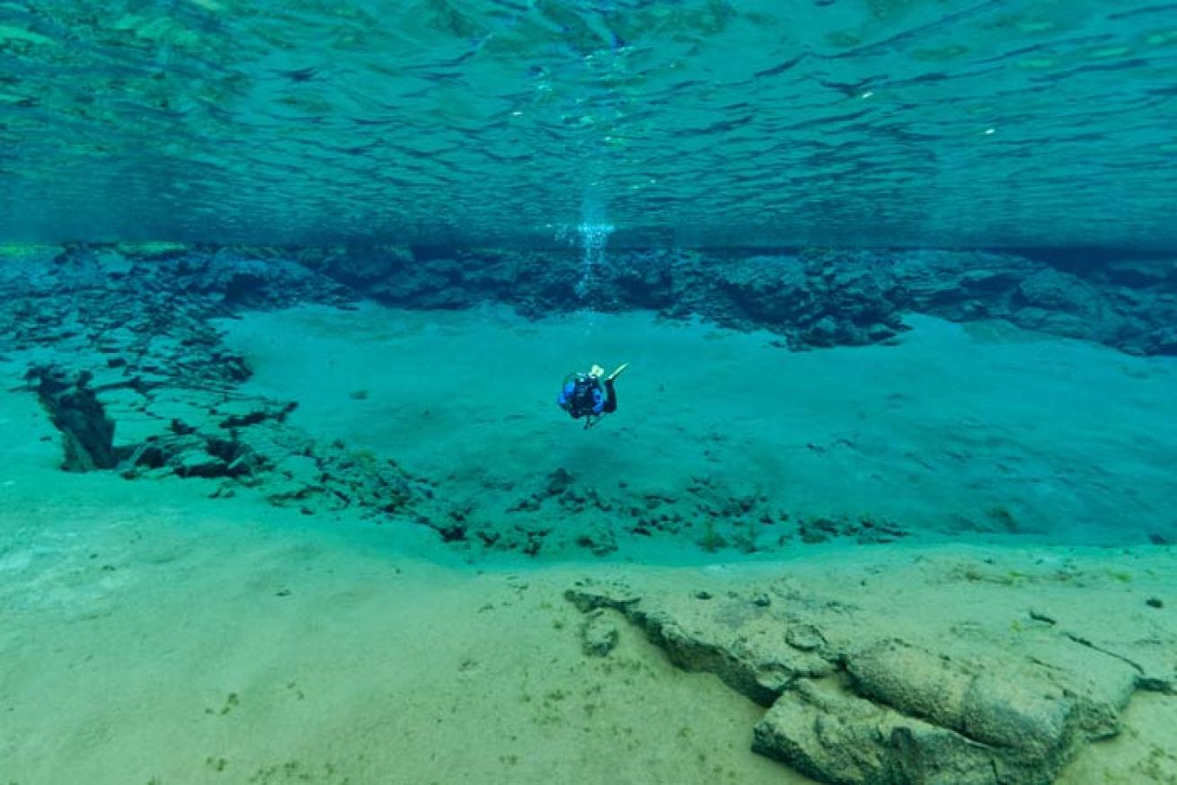Diver in Silfra Crack