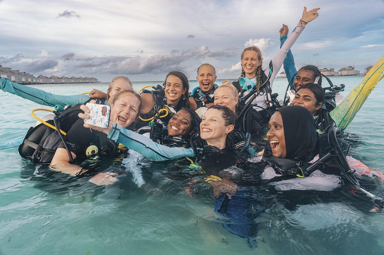 a group of female scuba divers