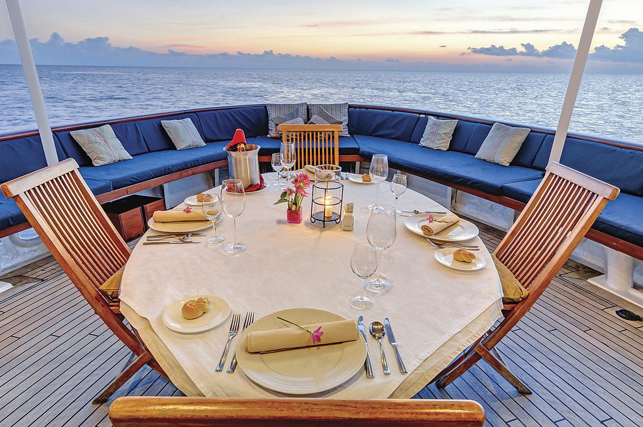 With a limited number of guests on board, diners are treated to intimate meals with stunning ocean panoramas as a backdrop.