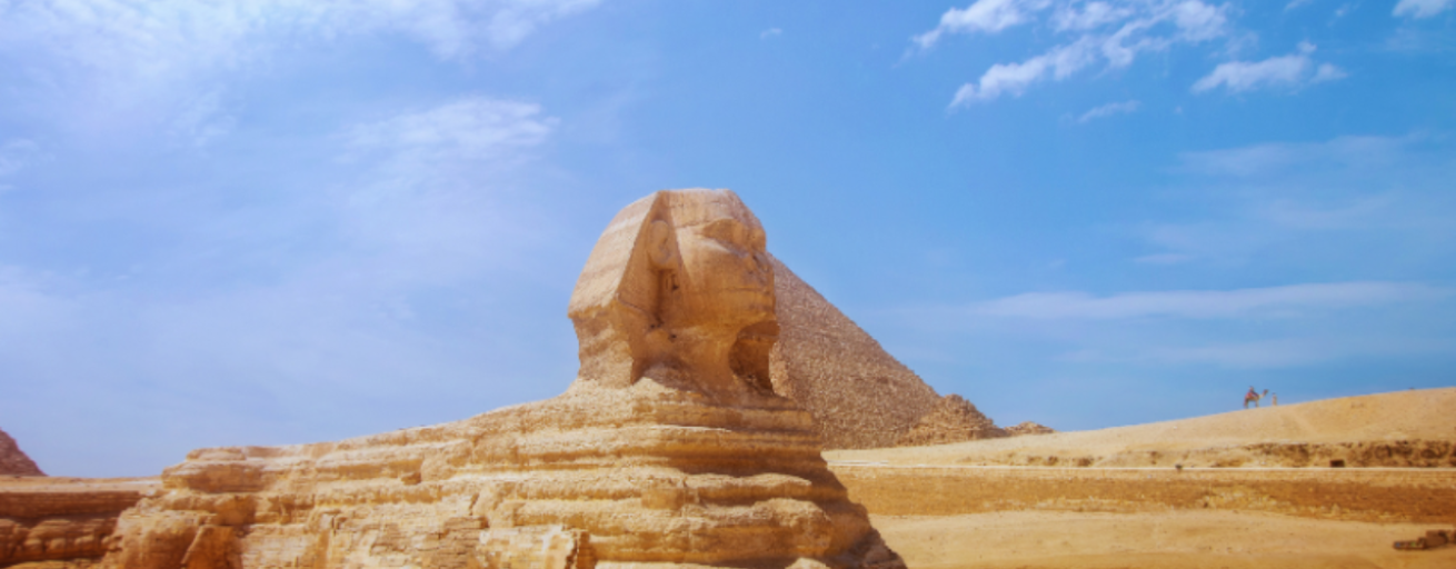 A sphinx statue in a desert