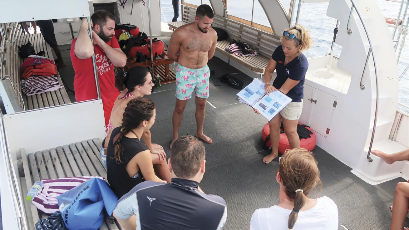 Guests are briefed before a dive.