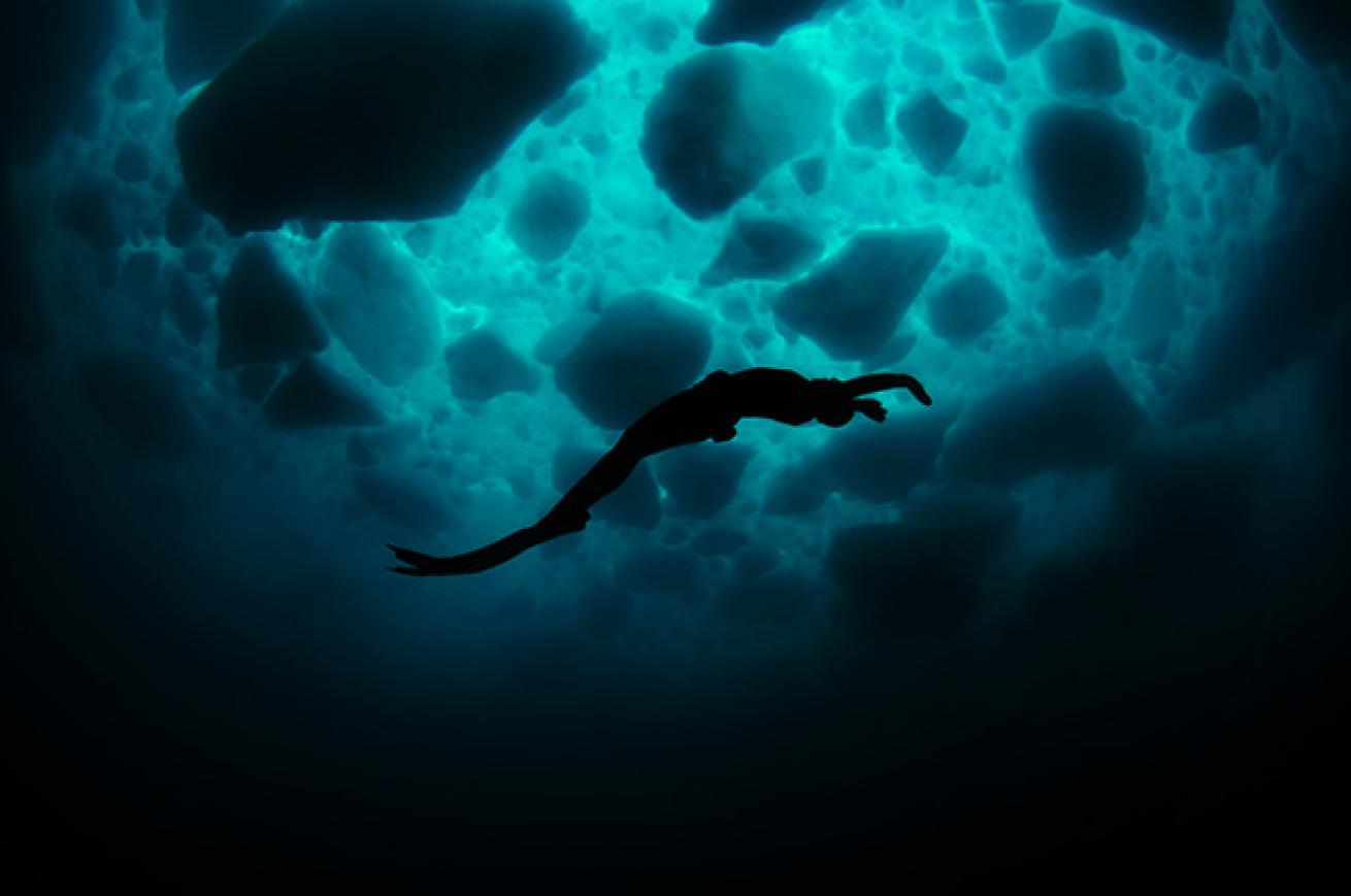 Free Diver Under Ice