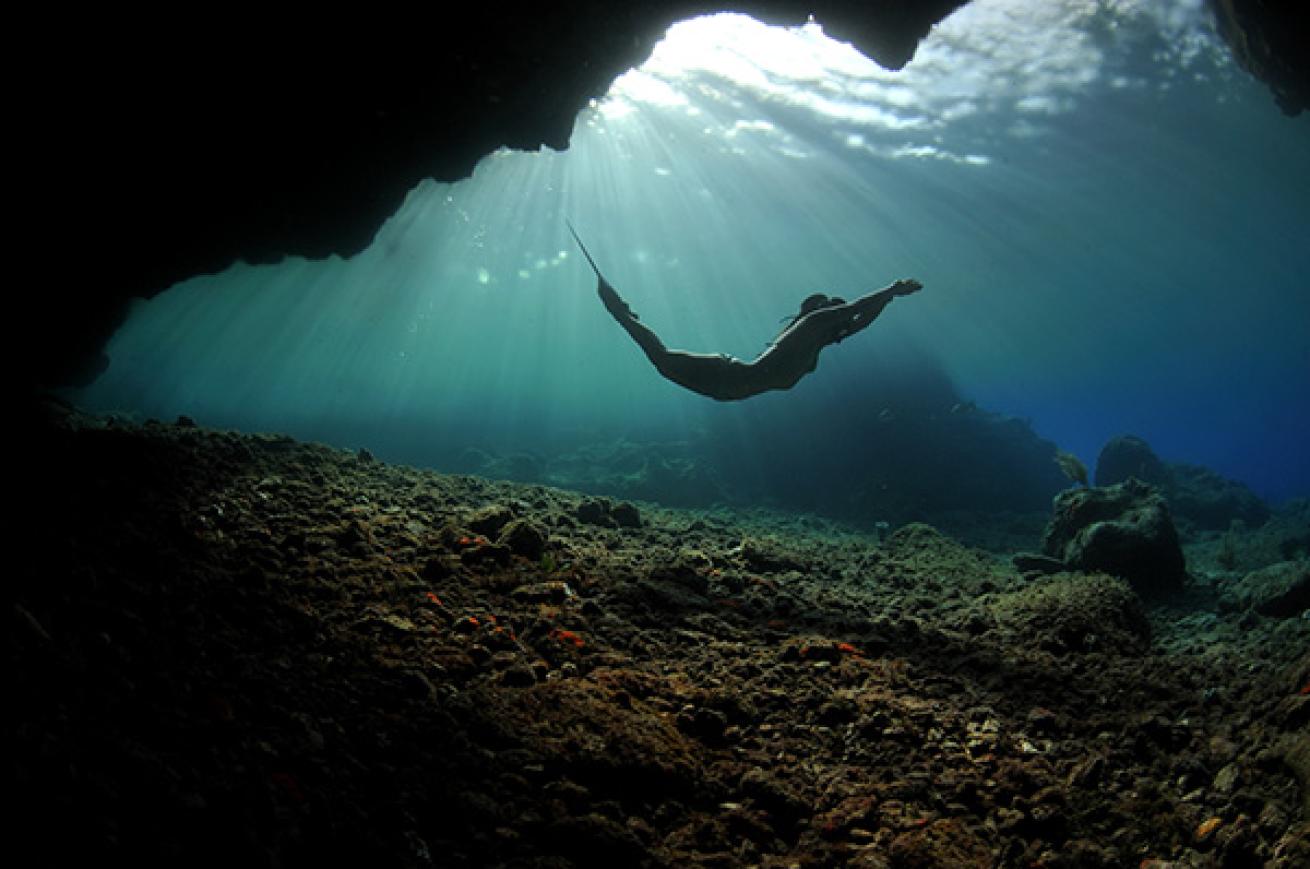 Free Diver at Cenote's Entrance