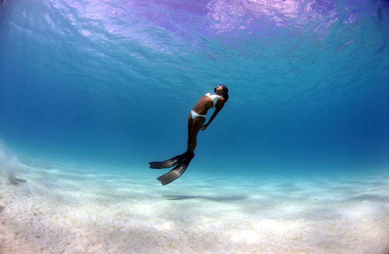 Free Diver in Shallow Lagoon