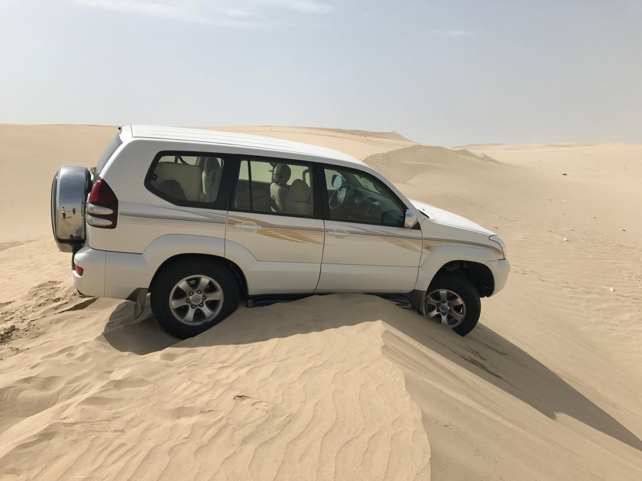 Car stuck in Qatar desert