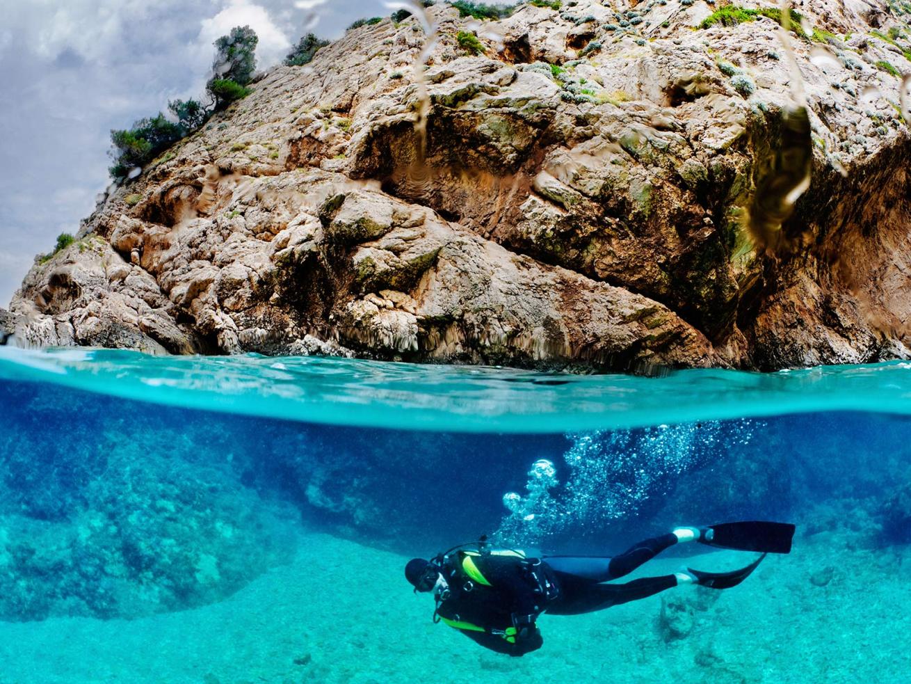 Scuba Diver Underwater Over Under Photo