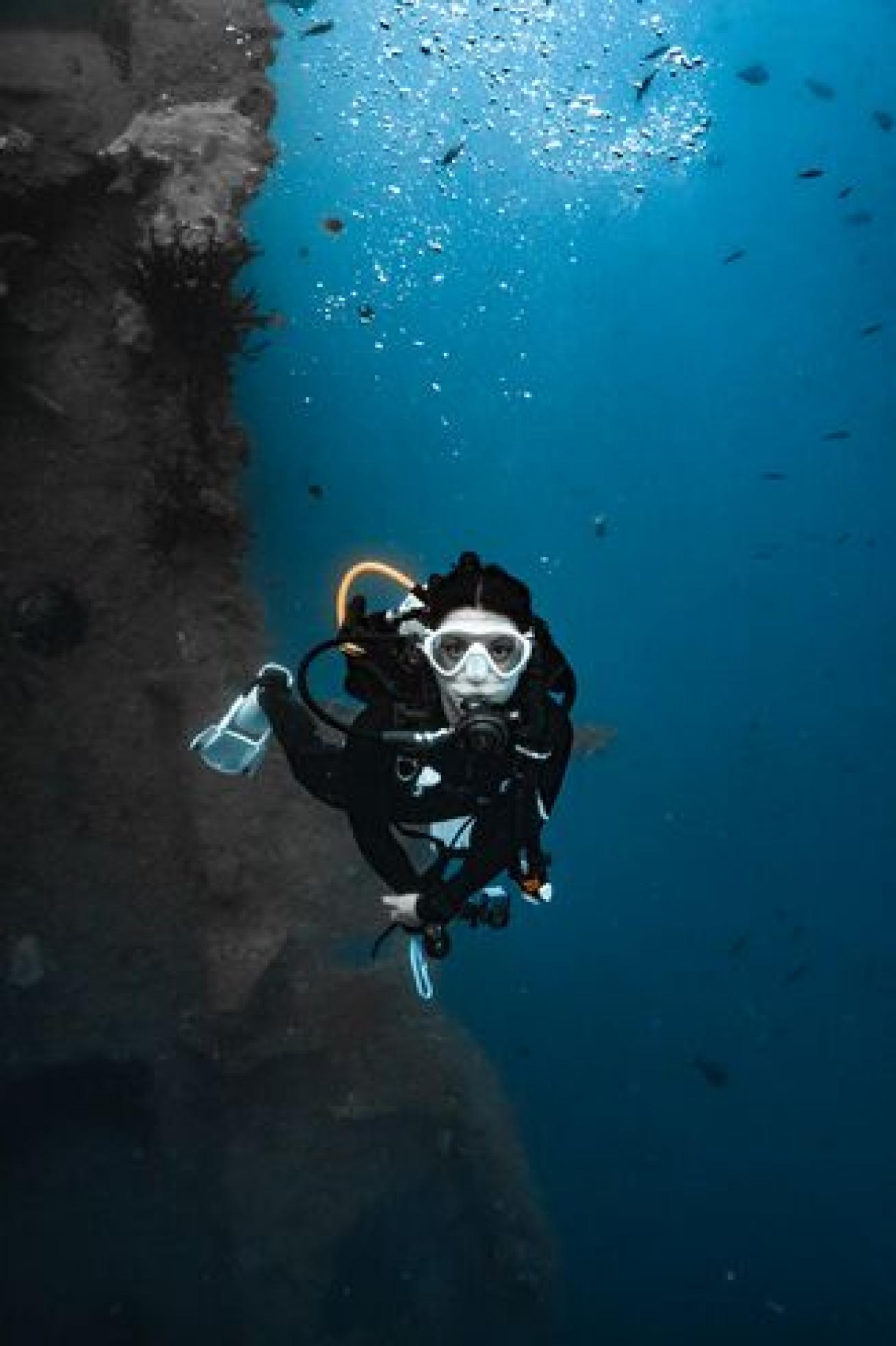 a diver Diving the *SS President Coolidge* in Santo, Vanuatu.