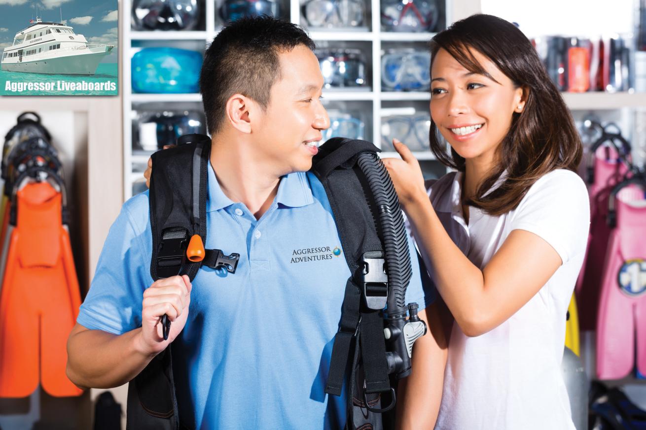 A group of people in a dive store