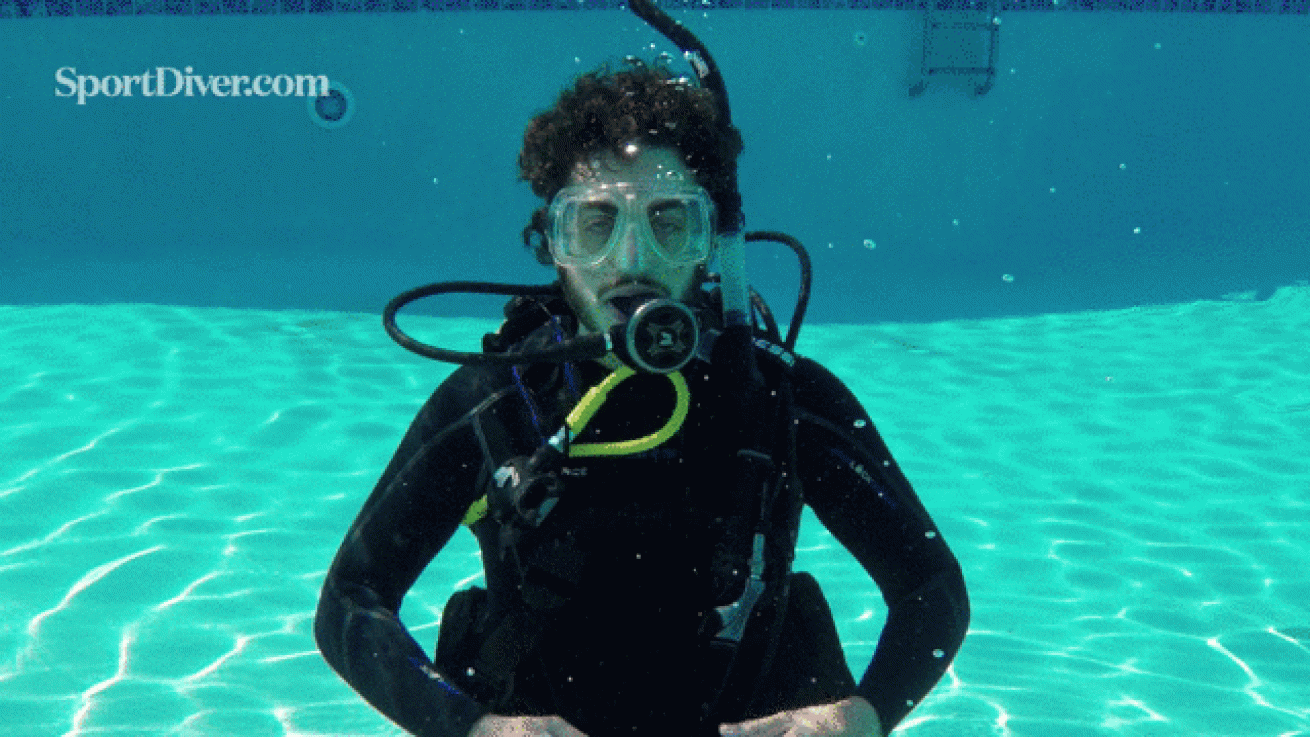 scuba hand signals weight