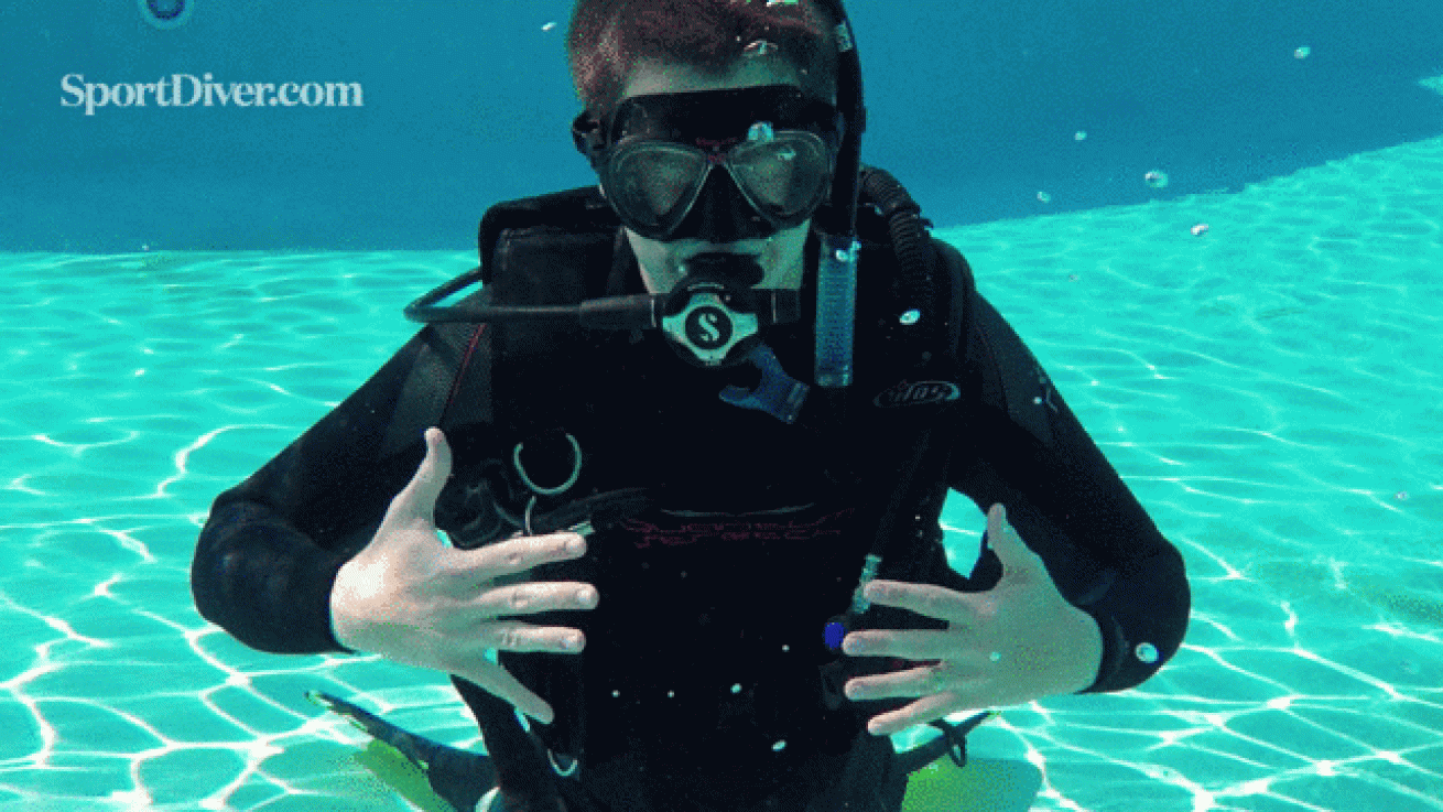 scuba hand signals pain