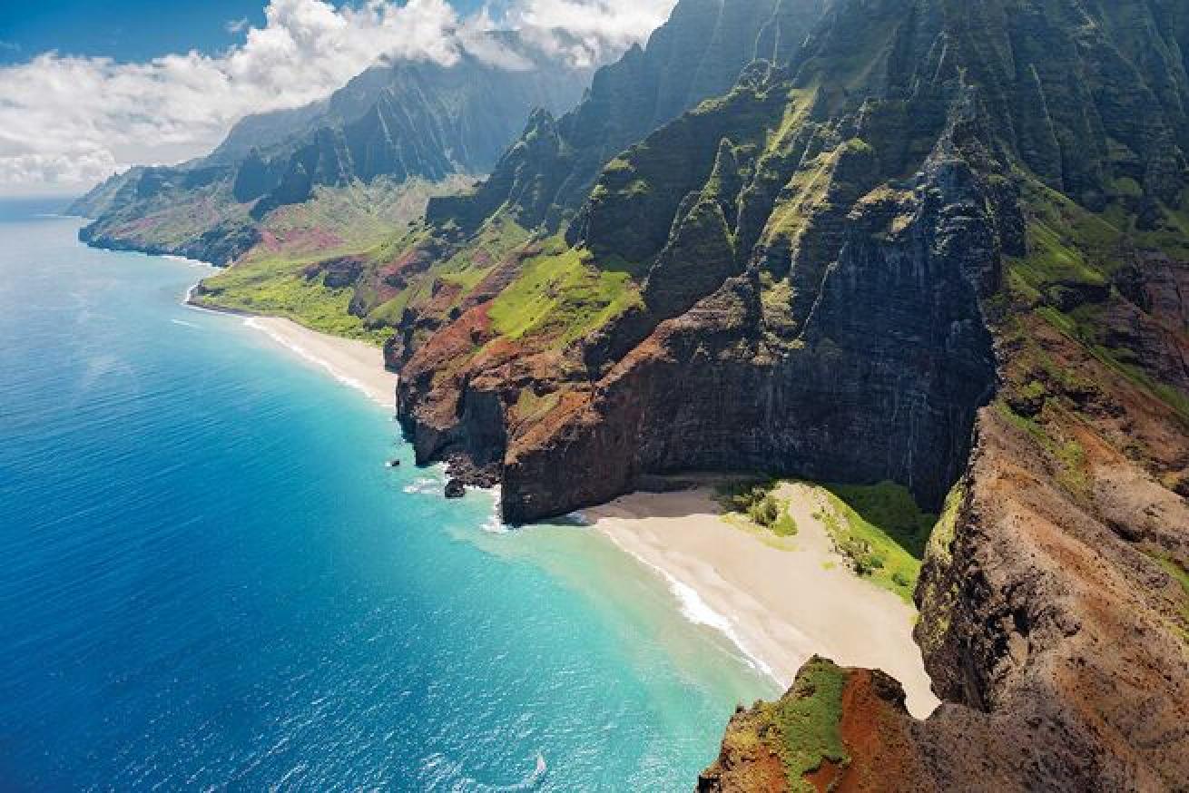 Off Kauai visit dive site Sheraton Caverns with Seasport Divers featuring gorgeous archways, overhangs and a variety of Hawaiian sea life.